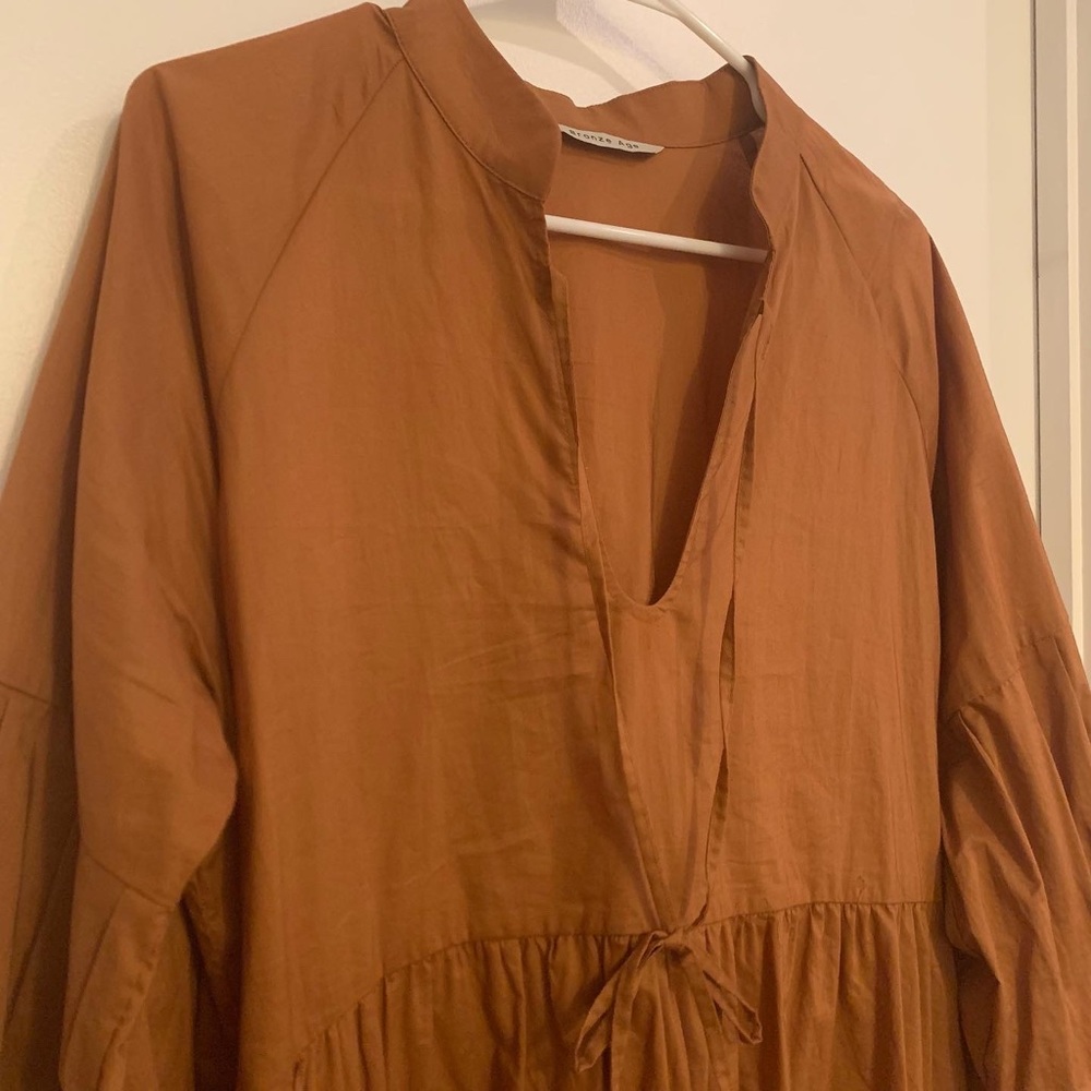 A Bronze Age Relaxed Puff Sleeve Midi Dress in Warm Rust - Picture 4 of 5